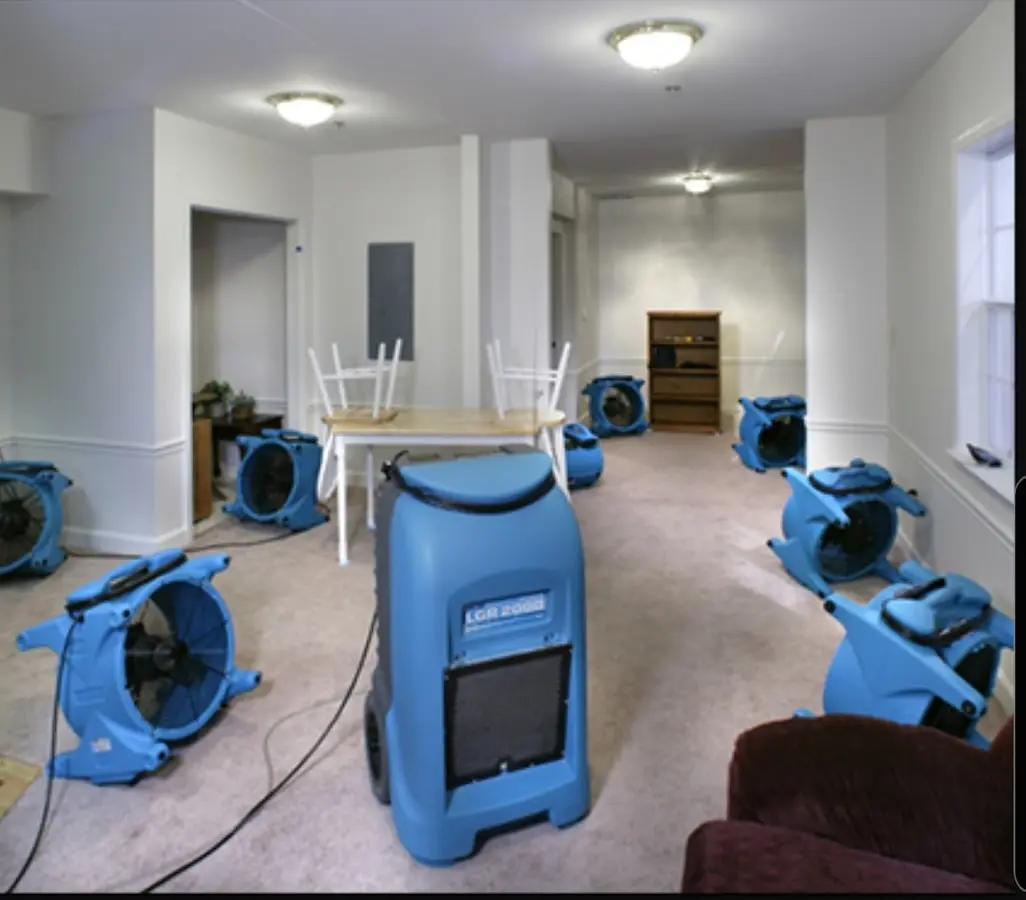 Air movers and dehumidifier setup for Water Damage Restoration in Carlisle